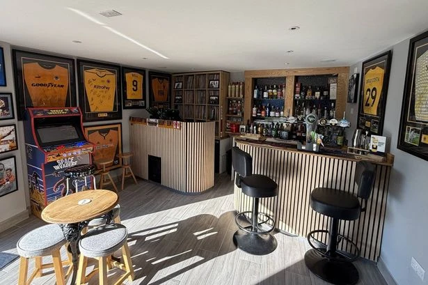 Inside stunning 'sheds' that give owners pubs in their back gardens