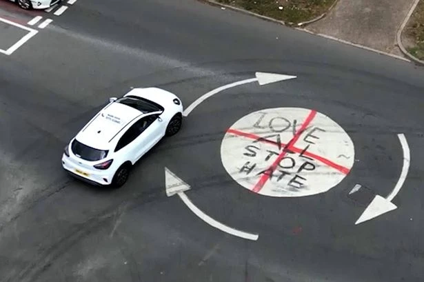 'Love All Stop Hate' painted over St George's Cross on Birmingham roundabout amid flag row