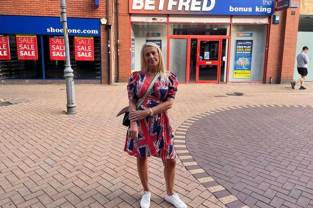 Woman in Union Jack dress turned away from Wetherspoon as pub bans flags amid protest