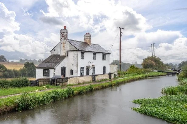 Gorgeous canalside cottage for sale for under £200k - but there's a catch