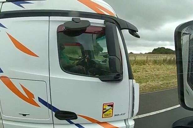 Police in undercover lorry 'super-cab' catch dozens of rule-breaking drivers in motorway crackdown