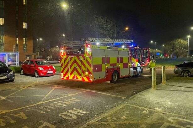 Fire crews called to tower block flooding after shower left running