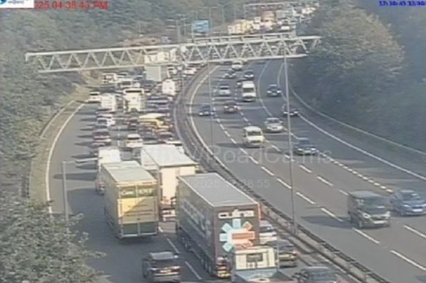 M6 huge delays live as drivers stuck in gridlock traffic near Birmingham after oil spillage