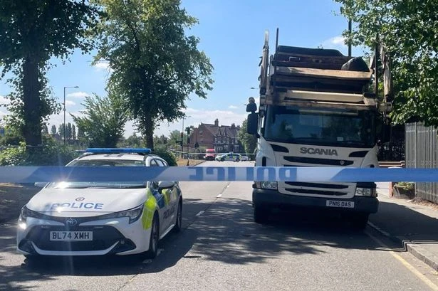 Man hit by bin lorry as driver speaks to police at scene