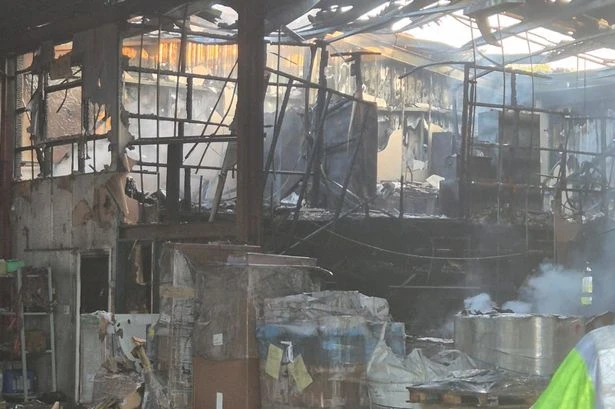 Fire rips through warehouse by M6 in Birmingham badly damaging building