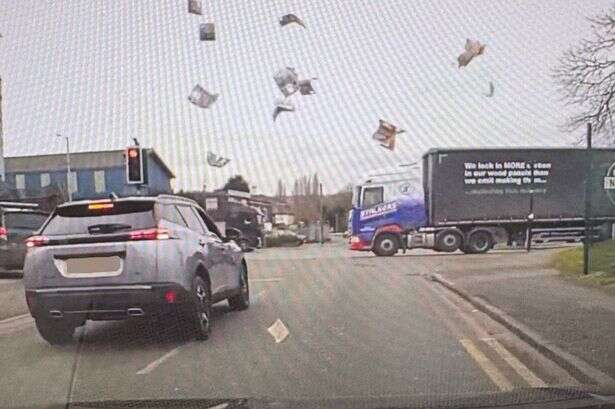 Moment crook chucks cash from car window in Oldbury police chase