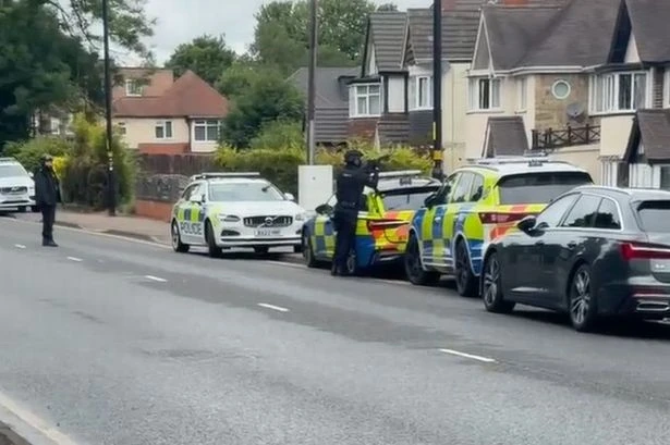 Armed police raid Sutton Coldfield home shutting down main road as firearms arrest made