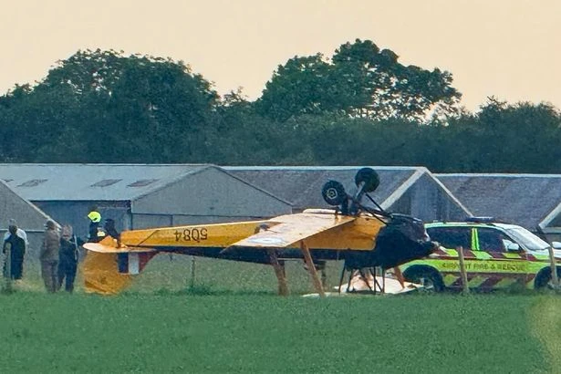 Plane crash in Devon lands upside down with two people onboard