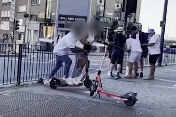 Video of hapless couple in awkward 'slow speed' e-scooter crash