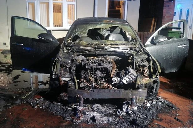 Child fears thug will 'burn family in sleep' as car torched in arson attack