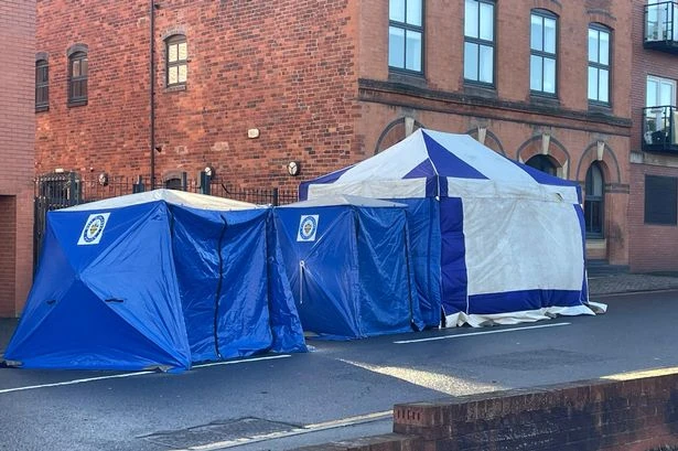 Police incident live as Clement Street blocked off and blue tents erected