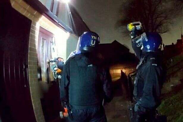 Dramatic moment police slash open door to Erdington home in new crime crackdown