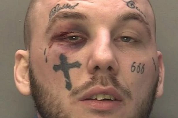 'Blessed' fugitive with 'devil tattoo' and black eye wanted by West Midlands Police