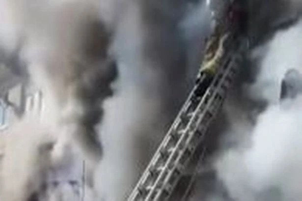 Dramatic moment man pulled out of burning flat near Villa Park
