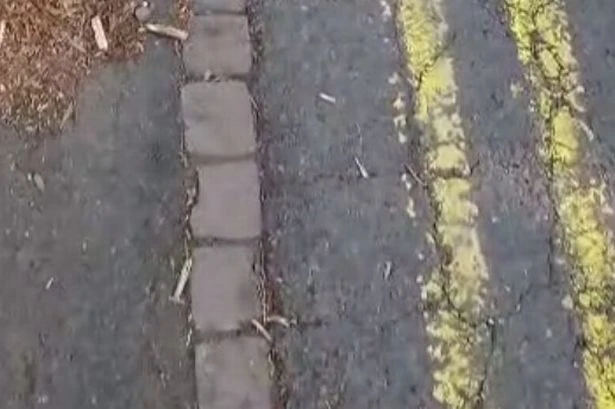 Mystery 'artist' repaints broken double yellow lines in leafy Birmingham suburb