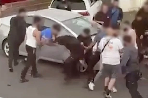 'Wild West' street brawl in Birmingham sees thug pull out machete