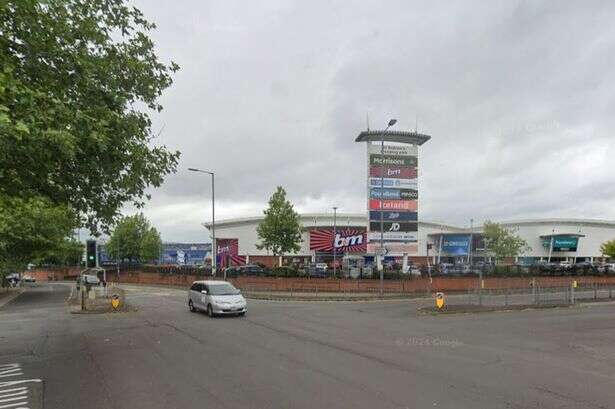 Man arrested after staff at busy Birmingham shopping park 'threatened'