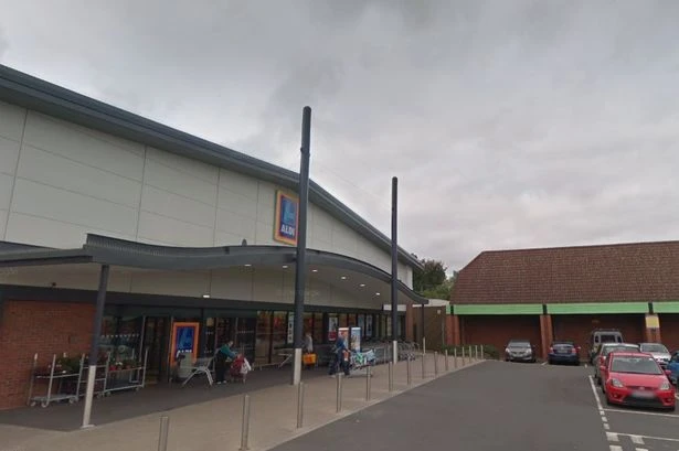 Knifeman arrested after Aldi handbag snatch at Midlands store