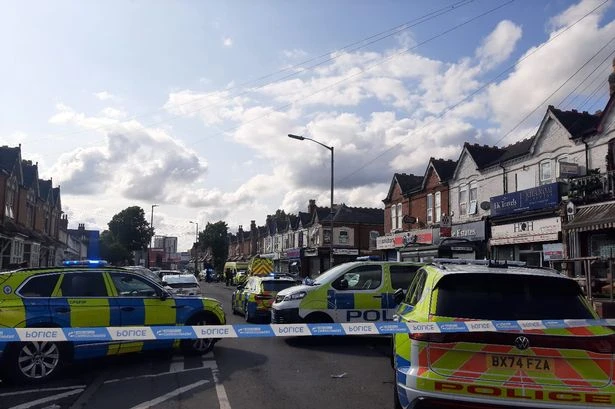 Aston Lane blocked live as police respond to 'man on roof' and homes evacuated