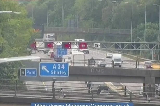 Bank Holiday getaway mayhem live after lorry crash closes M42 lanes