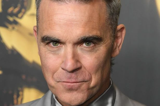 Robbie Williams says 'not ready for it' as he shares sad family update