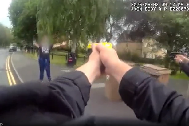 Moment armed police fire taser as 'man with knife' spotted near school