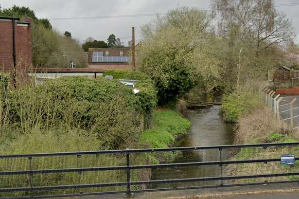 Police officers scouring brook near Dudley after reports of person in water