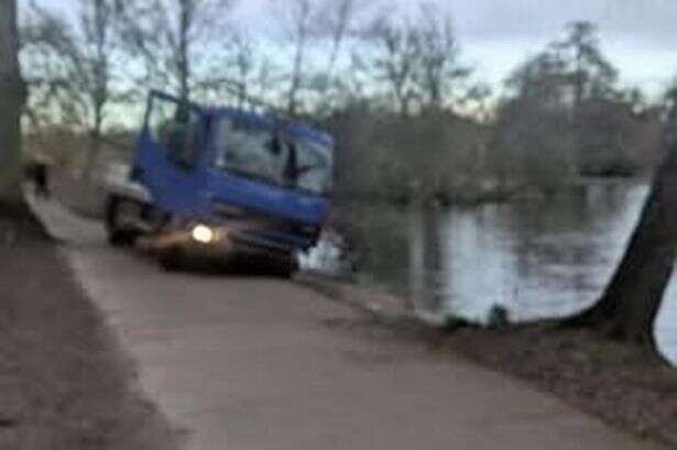 Stolen scaffolding truck driven through fence and dumped near pond