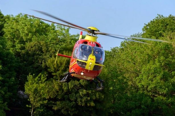 Two rushed to hospital after train crashes into tractor near Midlands farm
