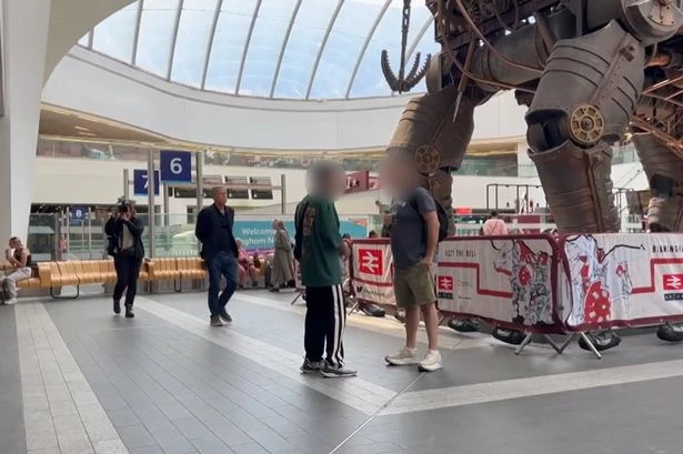 Secret Birmingham New Street footage shows gang associates collect cash for illegal Channel crossings