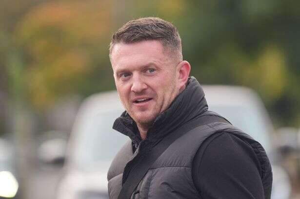 Tommy Robinson salutes supporters as he is locked up for 18 months