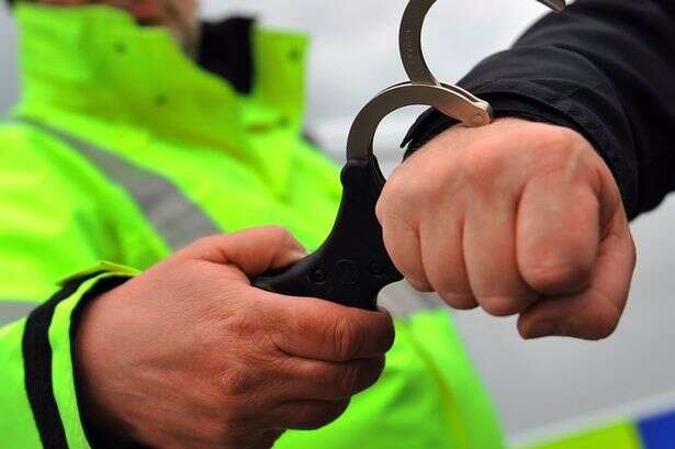 Police raid three homes across Birmingham and arrest two 'suspected drug dealers'