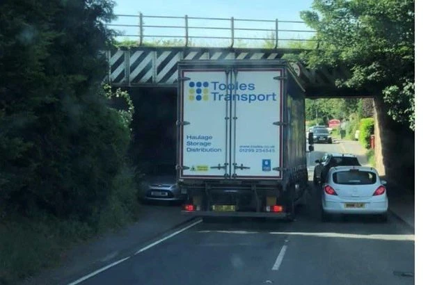 Moment lorry becomes trapped under bridge in Bromsgrove