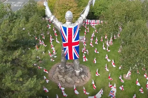 The Midland traffic island crammed with flags including huge one off 40ft statue