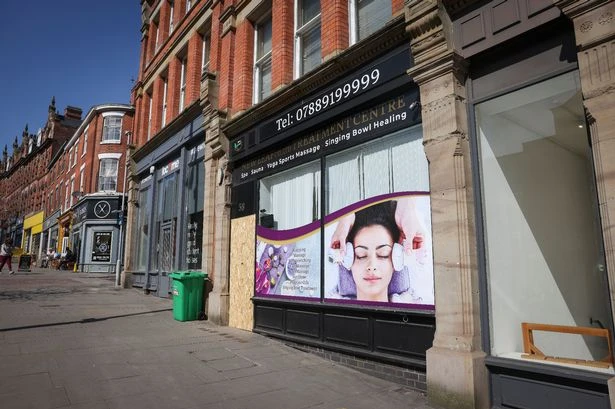 Police storm Midlands massage parlours in 'brothel' dawn raids
