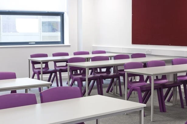Midlands PE teacher arrested at school over child sex abuse pictures says 'phone was hacked'