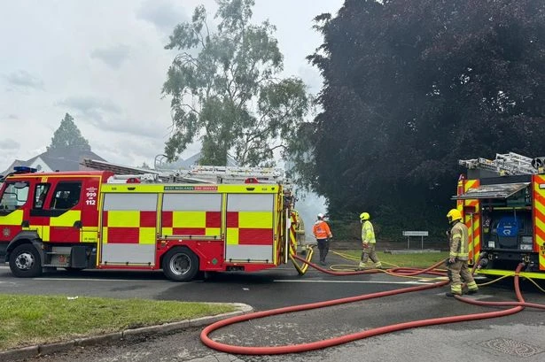 Sutton Coldfield fire live as seven crews battle thatched roof blaze
