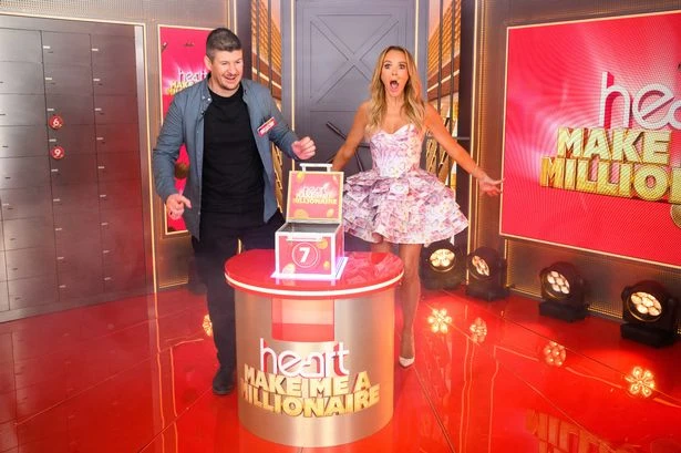 Tamworth dad embraces Amanda Holden after winning £1m live on Heart Breakfast