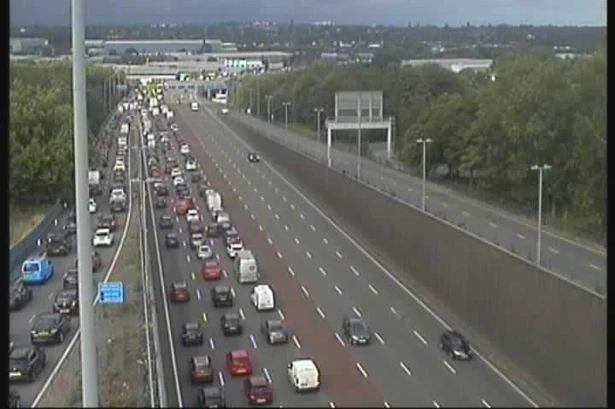 A38 Birmingham queues live as 'stranded sports car' causes rush-hour delays