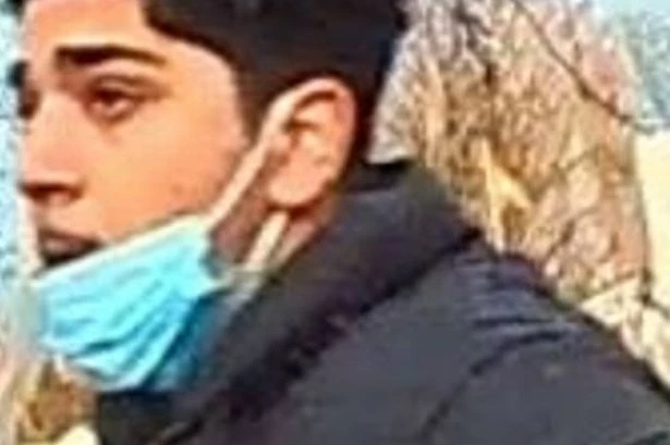 Police investigating Perry Barr trouble issue image of man in face mask