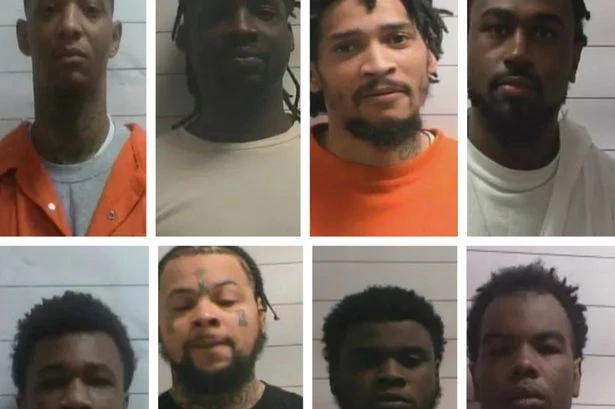 11 prisoners escape through hole in the wall and leave taunts to guards
