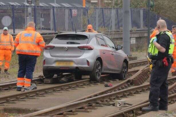 Crews remove dumped Corsa from city Metro tracks as police hunt abandoned car driver