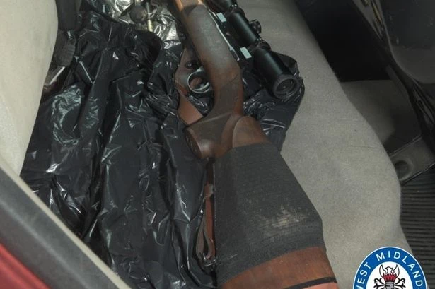Two arrested after sawn-off shotgun and a rifle found in car