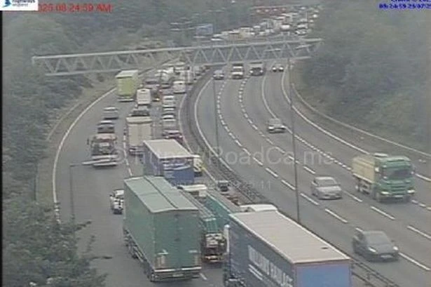 M6 Birmingham lorry crash live as drivers warned to expect 'long delays' amid six mile tailbacks