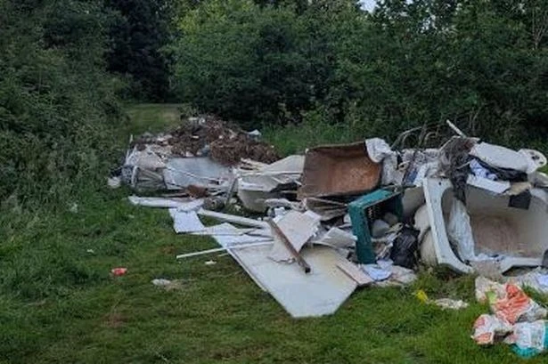 Huge piles of rubbish 'block paths' at Birmingham park as clean up starts after travellers leave