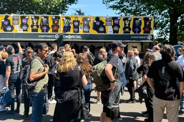 Hundreds of fans queue outside Villa Park Stadium the day before Black Sabbath gig