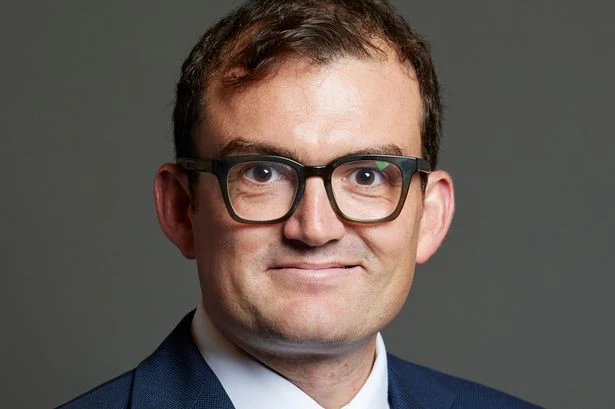 Tory MP charged by police over alleged sex attacks at private members club