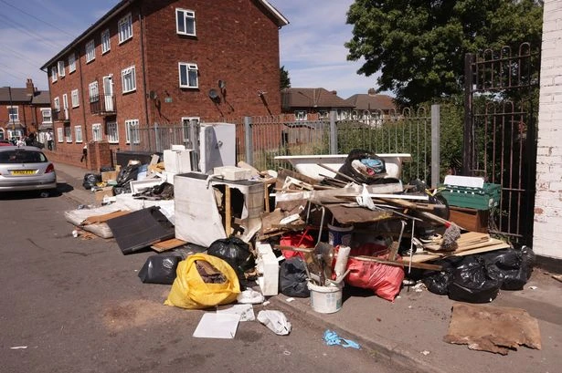 Birmingham locals forced into road to avoid mountain of stinking fly-tipped household waste