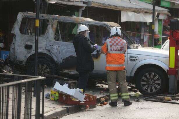 Breaking - Stratford Road arson probe as car ploughs into supermarket and is set on fire