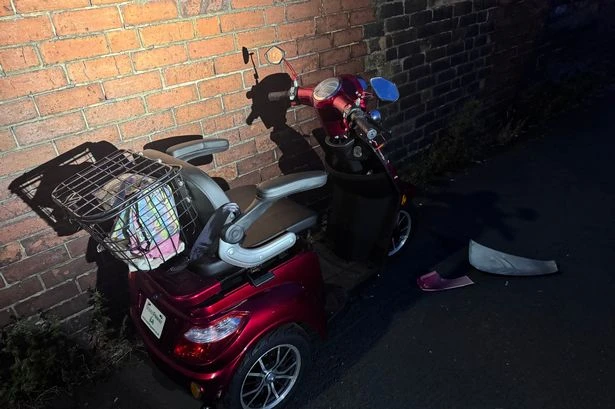 Thugs wearing balaclavas seen pushing mobility scooter down street